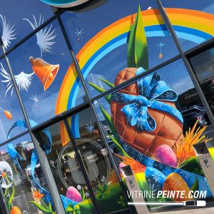 Paques.deco.printemps.fleurs.geant.hyper-U.decoraion.devanture.chocolat.peinture.decoration.virines.magasin.portes.automatiques
