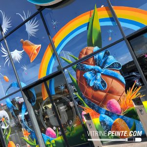 dessin sur vitre, déco de paque spéciale vitrine magasin 