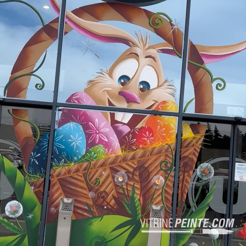 idée décoration : panier et lapin pâques géante, artiste peinture sur vitre Nice, déco magasin tendance 2026
