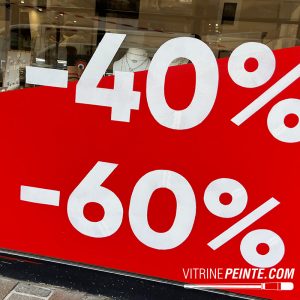 prix sticker solde géant peinture sur vitrine